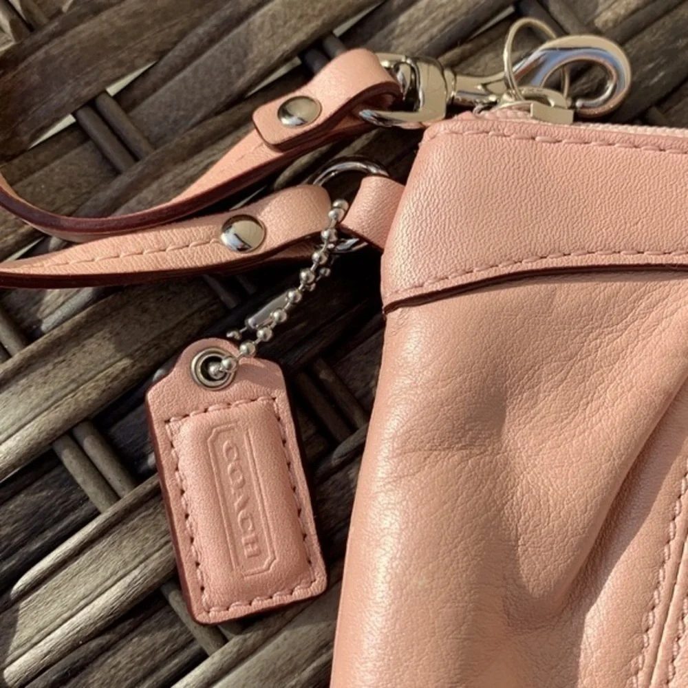 COACH Pearlescent Pale Pink Large Leather Wristlet